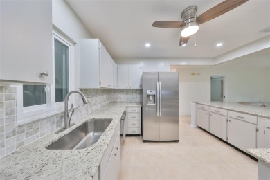 Under contract-accepting backup offers. One or more photo(s) has on Caloosa Greens Executive Golf Course in Florida - for sale on GolfHomes.com, golf home, golf lot