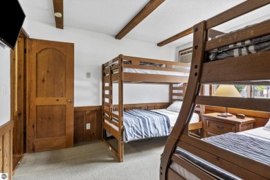 Amazing fully furnished condo with excellent rental history in on Crystal Mountain Golf Course in Michigan - for sale on GolfHomes.com, golf home, golf lot