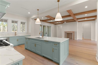 With grays, greens and classic cedar texture, this cottage on Frederica Golf Club in Georgia - for sale on GolfHomes.com, golf home, golf lot
