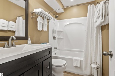 Amazing fully furnished condo with excellent rental history in on Crystal Mountain Golf Course in Michigan - for sale on GolfHomes.com, golf home, golf lot