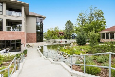 Amazing fully furnished condo with excellent rental history in on Crystal Mountain Golf Course in Michigan - for sale on GolfHomes.com, golf home, golf lot