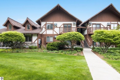 Amazing fully furnished condo with excellent rental history in on Crystal Mountain Golf Course in Michigan - for sale on GolfHomes.com, golf home, golf lot