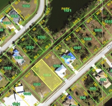 This oversized lot in the desirable Pinehurst of Rotonda West on Pinemoor West Golf Club in Florida - for sale on GolfHomes.com, golf home, golf lot