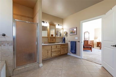 Welcome to this well-cared for 5-bedroom, 3.5-bathroom home in on The Highlands Golf Club in Montana - for sale on GolfHomes.com, golf home, golf lot