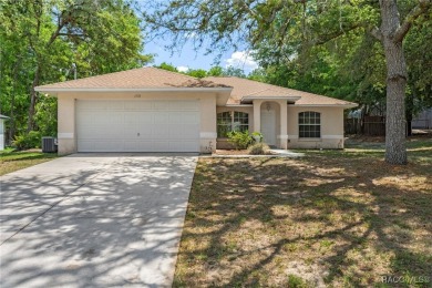 Located in the heart of Citrus Springs, 1574 W Lavender Lane on Citrus Springs Country Club in Florida - for sale on GolfHomes.com, golf home, golf lot