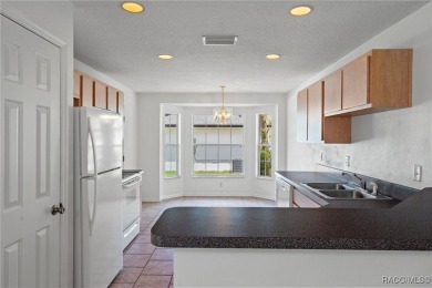 Located in the heart of Citrus Springs, 1574 W Lavender Lane on Citrus Springs Country Club in Florida - for sale on GolfHomes.com, golf home, golf lot