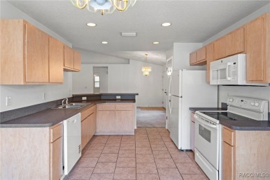 Located in the heart of Citrus Springs, 1574 W Lavender Lane on Citrus Springs Country Club in Florida - for sale on GolfHomes.com, golf home, golf lot