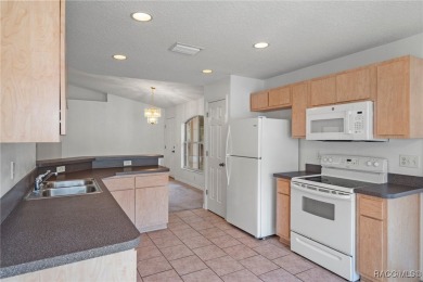 Located in the heart of Citrus Springs, 1574 W Lavender Lane on Citrus Springs Country Club in Florida - for sale on GolfHomes.com, golf home, golf lot