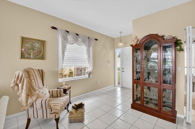 Stunning 3/2 corner unit coach home in the highly desired Boca on  in Florida - for sale on GolfHomes.com, golf home, golf lot