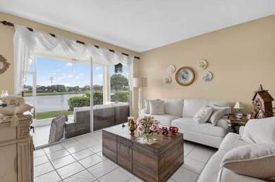 Stunning 3/2 corner unit coach home in the highly desired Boca on  in Florida - for sale on GolfHomes.com, golf home, golf lot