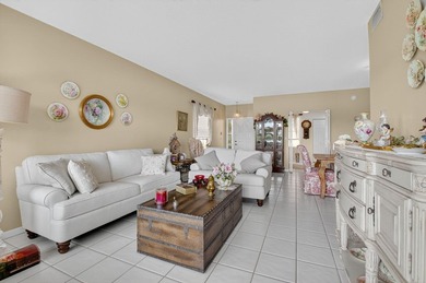 Stunning 3/2 corner unit coach home in the highly desired Boca on  in Florida - for sale on GolfHomes.com, golf home, golf lot