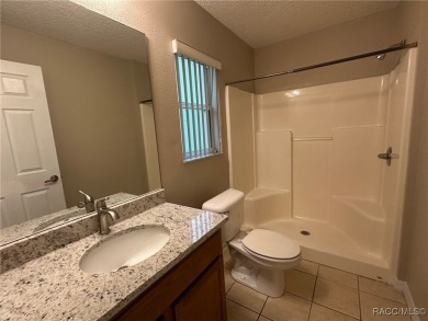 This beautifully renovated home in Citrus Springs boasts a range on Citrus Springs Country Club in Florida - for sale on GolfHomes.com, golf home, golf lot