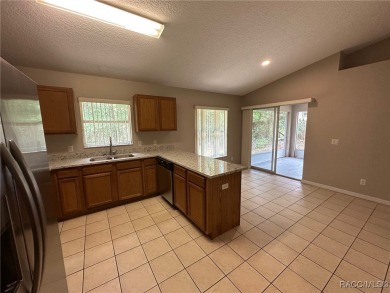 This beautifully renovated home in Citrus Springs boasts a range on Citrus Springs Country Club in Florida - for sale on GolfHomes.com, golf home, golf lot
