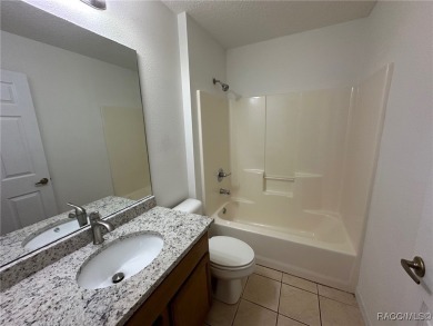 This beautifully renovated home in Citrus Springs boasts a range on Citrus Springs Country Club in Florida - for sale on GolfHomes.com, golf home, golf lot
