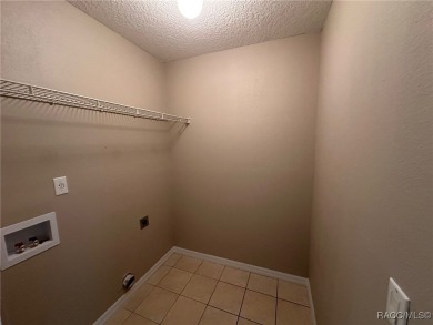 This beautifully renovated home in Citrus Springs boasts a range on Citrus Springs Country Club in Florida - for sale on GolfHomes.com, golf home, golf lot