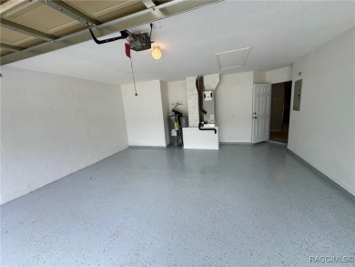 This beautifully renovated home in Citrus Springs boasts a range on Citrus Springs Country Club in Florida - for sale on GolfHomes.com, golf home, golf lot