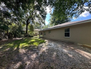 This beautifully renovated home in Citrus Springs boasts a range on Citrus Springs Country Club in Florida - for sale on GolfHomes.com, golf home, golf lot