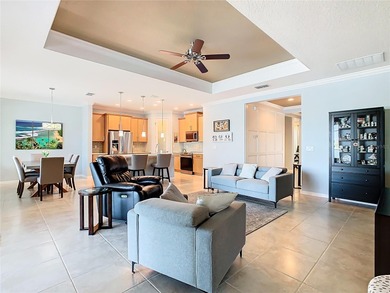 STUNNING & SPOTLESS CABELLA model with a heated Salt Water POOL on Stonegate Golf Club in Florida - for sale on GolfHomes.com, golf home, golf lot