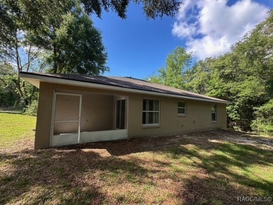 This beautifully renovated home in Citrus Springs boasts a range on Citrus Springs Country Club in Florida - for sale on GolfHomes.com, golf home, golf lot