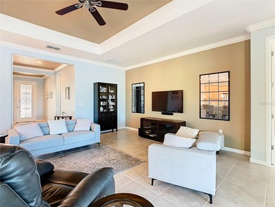 STUNNING & SPOTLESS CABELLA model with a heated Salt Water POOL on Stonegate Golf Club in Florida - for sale on GolfHomes.com, golf home, golf lot