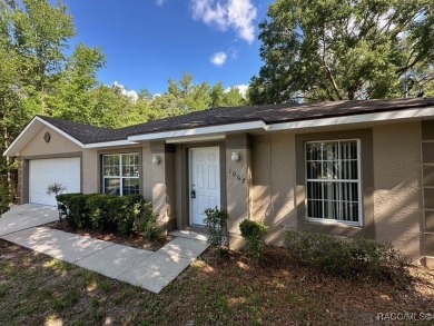This beautifully renovated home in Citrus Springs boasts a range on Citrus Springs Country Club in Florida - for sale on GolfHomes.com, golf home, golf lot
