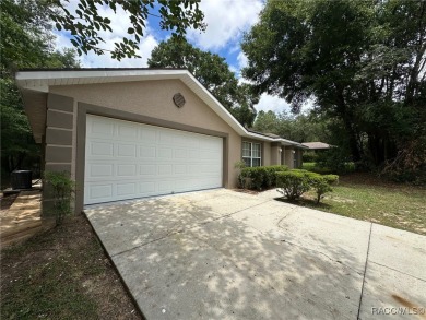 This beautifully renovated home in Citrus Springs boasts a range on Citrus Springs Country Club in Florida - for sale on GolfHomes.com, golf home, golf lot