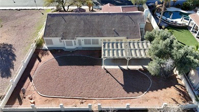 Discover a rare opportunity to own a single-family home with on Boulder City Municipal Golf Course in Nevada - for sale on GolfHomes.com, golf home, golf lot