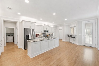 Welcome to this exceptional 4-bedroom, 3.5-bath Modern Craftsman on Woodfin Ridge Golf Club in South Carolina - for sale on GolfHomes.com, golf home, golf lot