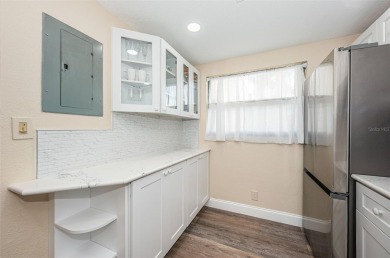 Great value in this beautifully renovated ground floor villa on Isla Del Sol Yacht and Country Club in Florida - for sale on GolfHomes.com, golf home, golf lot