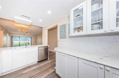 Great value in this beautifully renovated ground floor villa on Isla Del Sol Yacht and Country Club in Florida - for sale on GolfHomes.com, golf home, golf lot