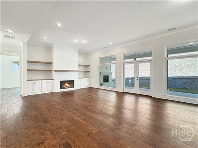 Discover easy coastal living in The Dover Bluff, a bright and on The Golf Club At Sanctuary Cove in Georgia - for sale on GolfHomes.com, golf home, golf lot