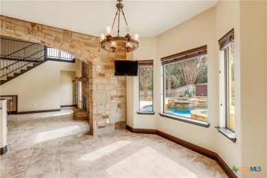 This luxurious Mediterranean-style home boasts of views of Lake on Highland Lakes Golf Course in Texas - for sale on GolfHomes.com, golf home, golf lot