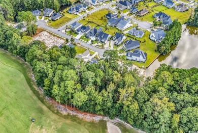 This beautiful direct golf course lot on a cul de sac is located on Wild Wing Plantation in South Carolina - for sale on GolfHomes.com, golf home, golf lot