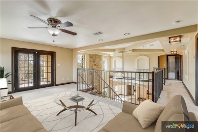 This luxurious Mediterranean-style home boasts of views of Lake on Highland Lakes Golf Course in Texas - for sale on GolfHomes.com, golf home, golf lot