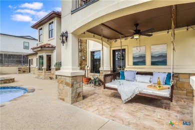 This luxurious Mediterranean-style home boasts of views of Lake on Highland Lakes Golf Course in Texas - for sale on GolfHomes.com, golf home, golf lot