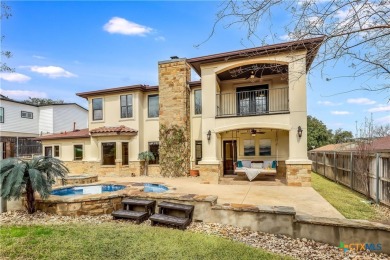 This luxurious Mediterranean-style home boasts of views of Lake on Highland Lakes Golf Course in Texas - for sale on GolfHomes.com, golf home, golf lot