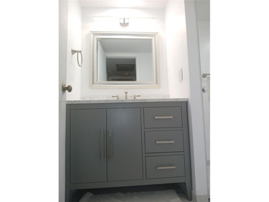 A RidgeWood Retreat! NEWLY UPDATED and beautifully maintained on Pine Island Ridge Country Club in Florida - for sale on GolfHomes.com, golf home, golf lot