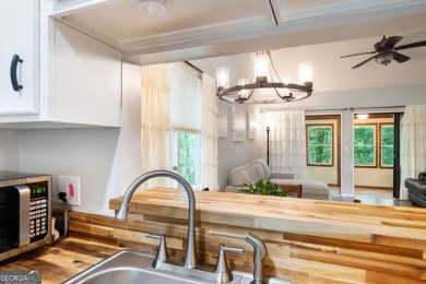 Live the resort life in this adorable 2 bedroom, 2 full bath* on The Highlands Course at Lake Arrowhead in Georgia - for sale on GolfHomes.com, golf home, golf lot
