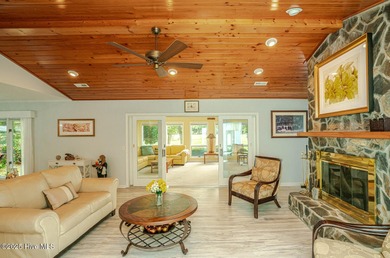 Spacious Coastal Retreat with Sunroom & Outdoor Entertaining on Brick Landing Plantation Yacht and Golf Club in North Carolina - for sale on GolfHomes.com, golf home, golf lot