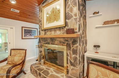 Spacious Coastal Retreat with Sunroom & Outdoor Entertaining on Brick Landing Plantation Yacht and Golf Club in North Carolina - for sale on GolfHomes.com, golf home, golf lot