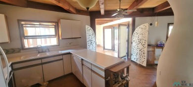 This Santa Fe style home is absolutely charming and rich in on Sierra Del Rio Golf Club in New Mexico - for sale on GolfHomes.com, golf home, golf lot