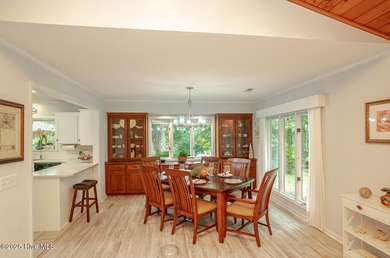 Spacious Coastal Retreat with Sunroom & Outdoor Entertaining on Brick Landing Plantation Yacht and Golf Club in North Carolina - for sale on GolfHomes.com, golf home, golf lot