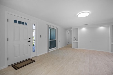 Discover the perfect blend of coastal luxury and modern comfort on Rotonda Golf and Country Club The Links Course in Florida - for sale on GolfHomes.com, golf home, golf lot