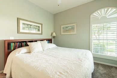 This Beautiful villa in Heritage Greens offers stunning lake and on Arrowhead Golf Club At Heritage Greens in Florida - for sale on GolfHomes.com, golf home, golf lot