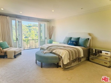Nestled in one of Los Angeles' most coveted communities, this on Mountain Gate Country Club in California - for sale on GolfHomes.com, golf home, golf lot