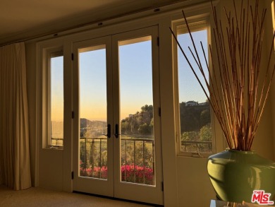 Nestled in one of Los Angeles' most coveted communities, this on Mountain Gate Country Club in California - for sale on GolfHomes.com, golf home, golf lot
