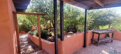 This Santa Fe style home is absolutely charming and rich in on Sierra Del Rio Golf Club in New Mexico - for sale on GolfHomes.com, golf home, golf lot