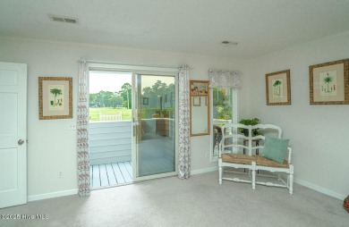 Spacious Coastal Retreat with Sunroom & Outdoor Entertaining on Brick Landing Plantation Yacht and Golf Club in North Carolina - for sale on GolfHomes.com, golf home, golf lot