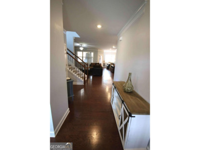 Enter this tranquil retreat that exudes a quiet elegance.  Step on Berkeley Hills Country Club in Georgia - for sale on GolfHomes.com, golf home, golf lot