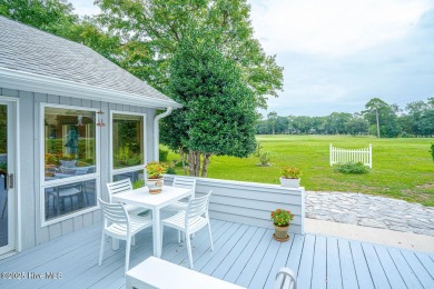 Spacious Coastal Retreat with Sunroom & Outdoor Entertaining on Brick Landing Plantation Yacht and Golf Club in North Carolina - for sale on GolfHomes.com, golf home, golf lot